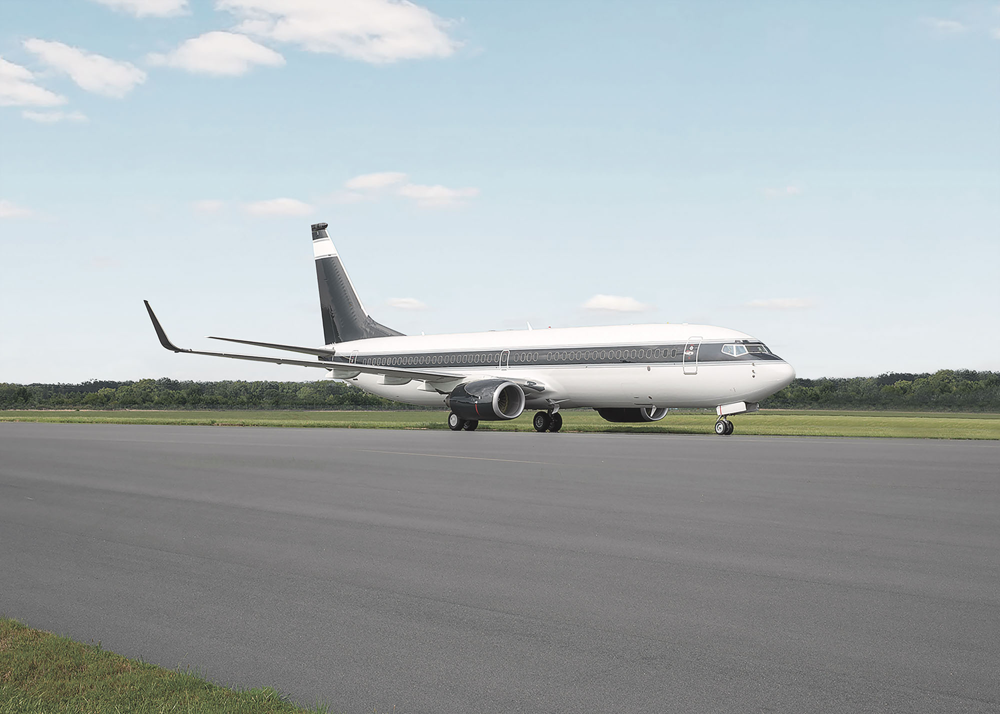 BBJ2 private charter jet on the runway